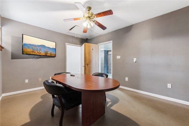 office area with ceiling fan and carpet