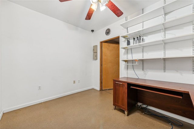 unfurnished office featuring ceiling fan