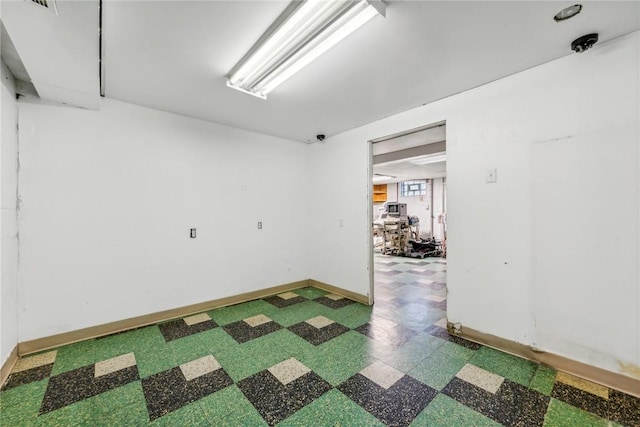 1565 State Route 31, East Huntingdon, PA 15666 - unfurnished room with tile patterned floors and baseboards
