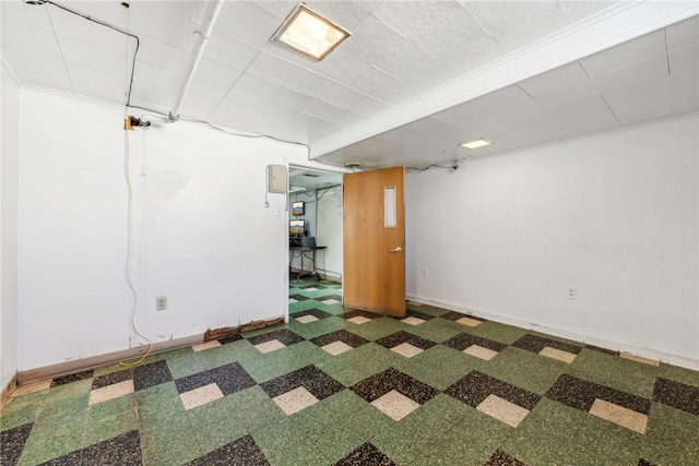 basement featuring crown molding