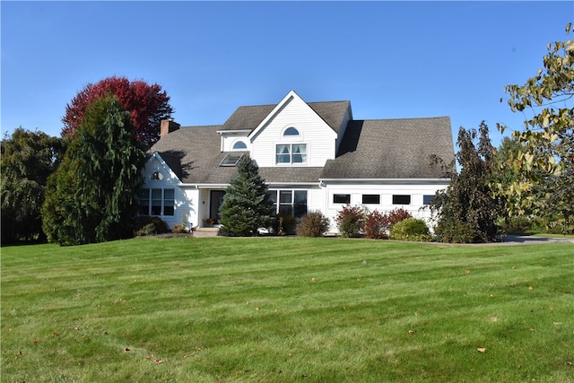 view of front of home featuring a front yard