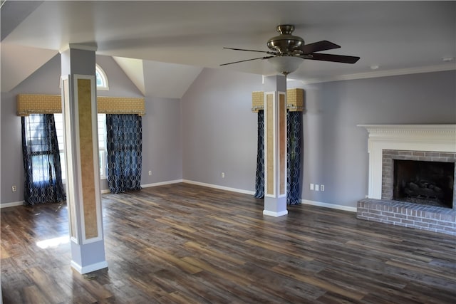 unfurnished living room with dark wood-type flooring, ornamental molding, a fireplace, and ceiling fan