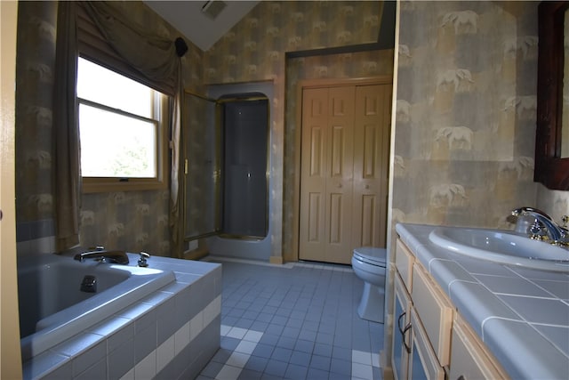 full bathroom featuring toilet, vaulted ceiling, separate shower and tub, tile patterned floors, and vanity