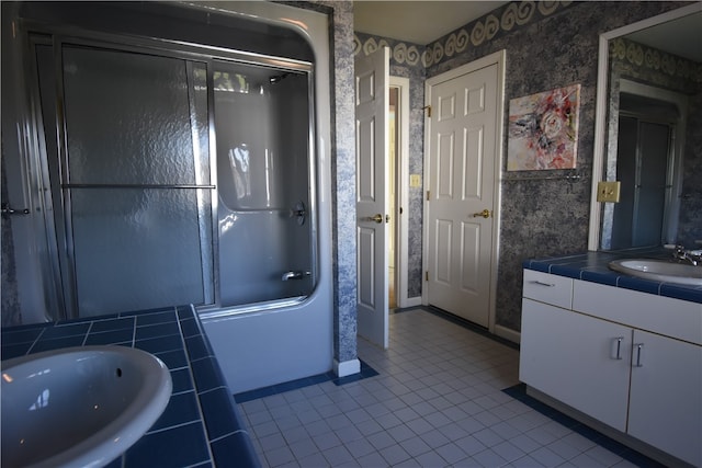 bathroom with tile patterned flooring, vanity, and plus walk in shower