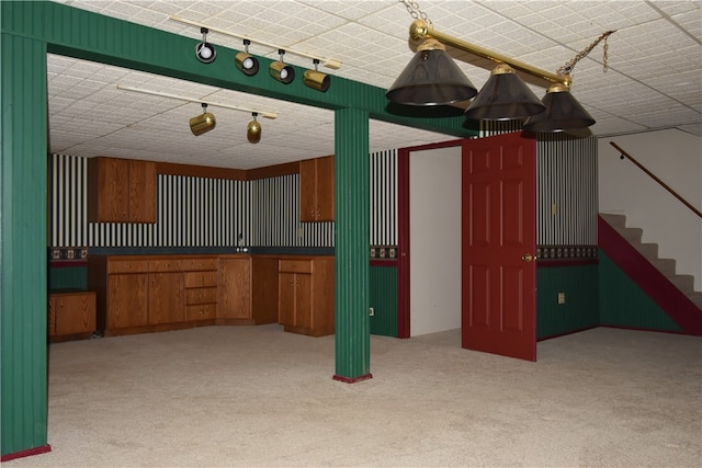 kitchen with light colored carpet