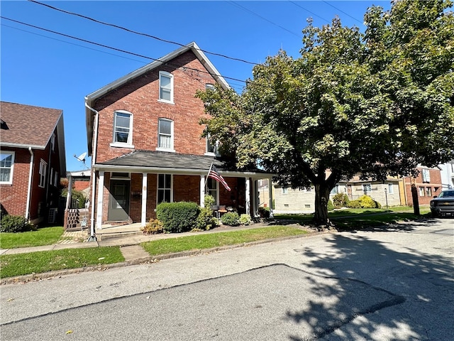 view of front of home featuring covered porch