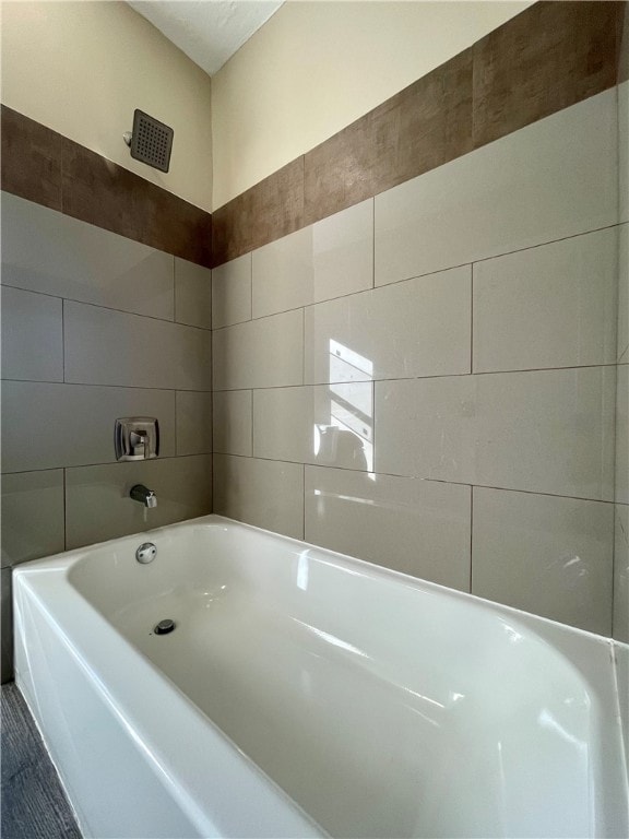 bathroom with shower with separate bathtub