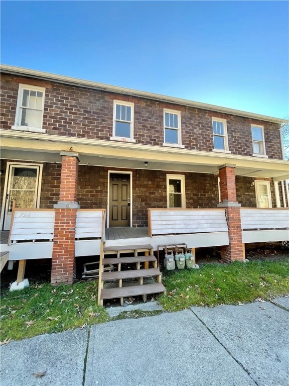 multi unit property featuring covered porch