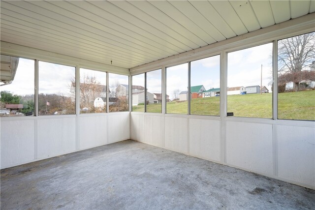 unfurnished sunroom with a wealth of natural light