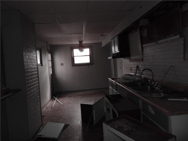 571 2nd St, Pitcairn, PA 15140 - kitchen with a sink, tasteful backsplash, and a drop ceiling