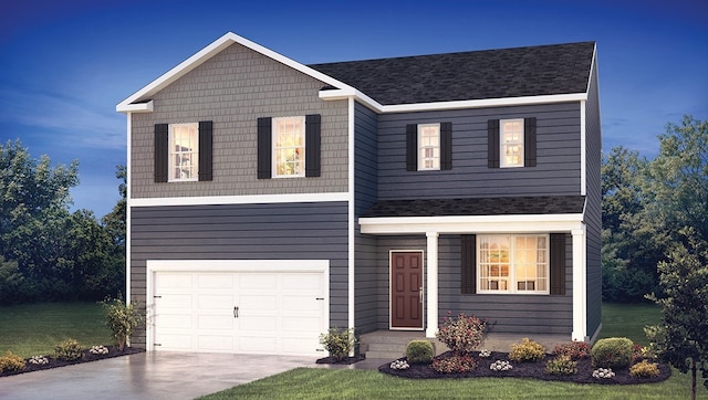 view of front facade with a garage and a front yard