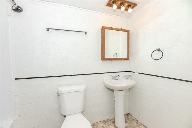 bathroom featuring sink and toilet