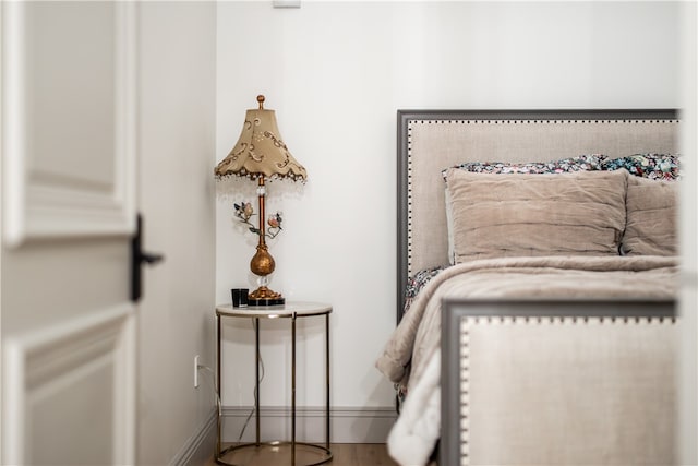 bedroom featuring hardwood / wood-style floors