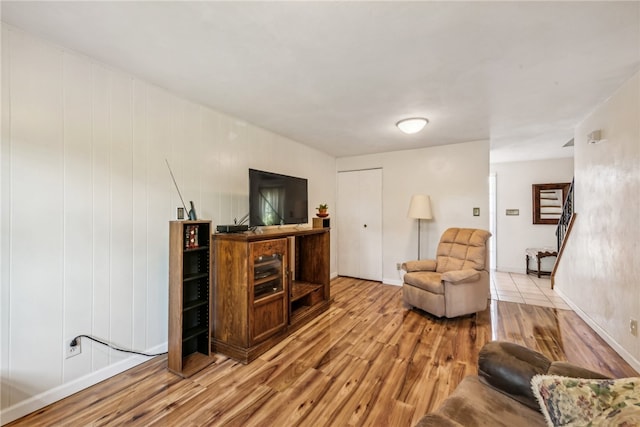 living room with light hardwood / wood-style flooring