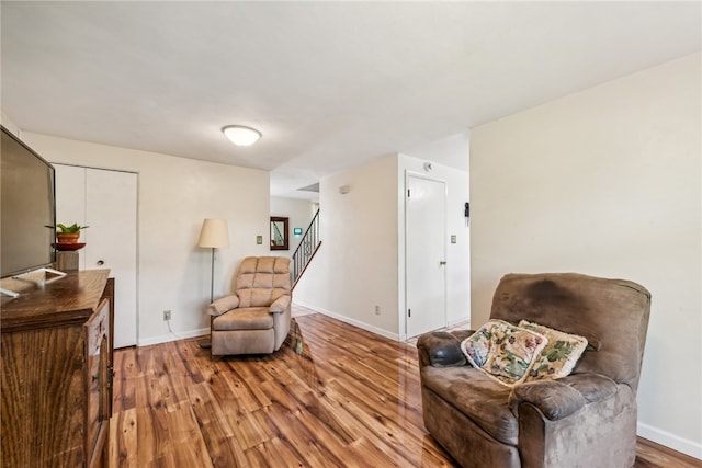 sitting room featuring hardwood / wood-style flooring