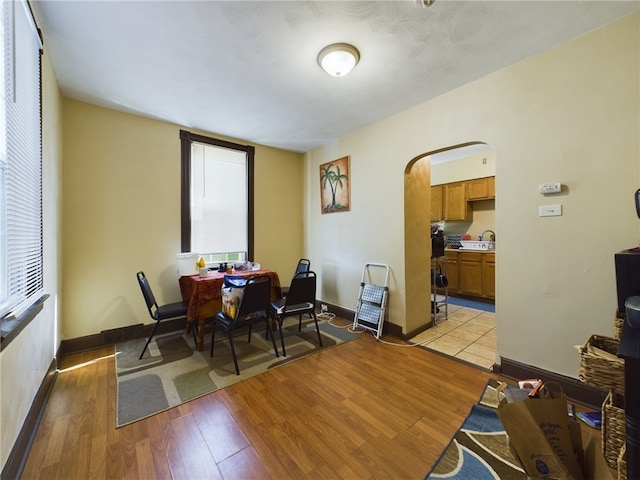 dining area with light wood-type flooring