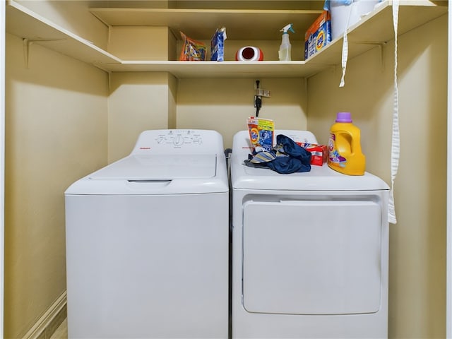 laundry room with washer and dryer