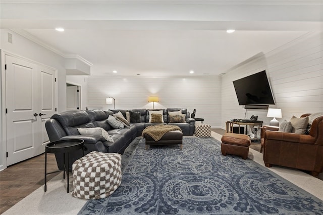 living room featuring crown molding and hardwood / wood-style floors