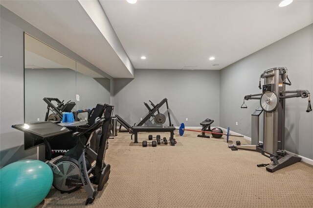 exercise area featuring carpet flooring