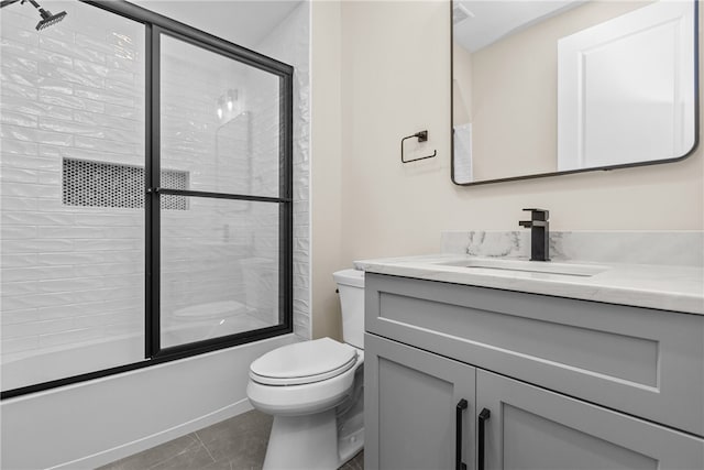 full bathroom featuring vanity, toilet, and enclosed tub / shower combo