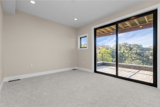 view of carpeted spare room