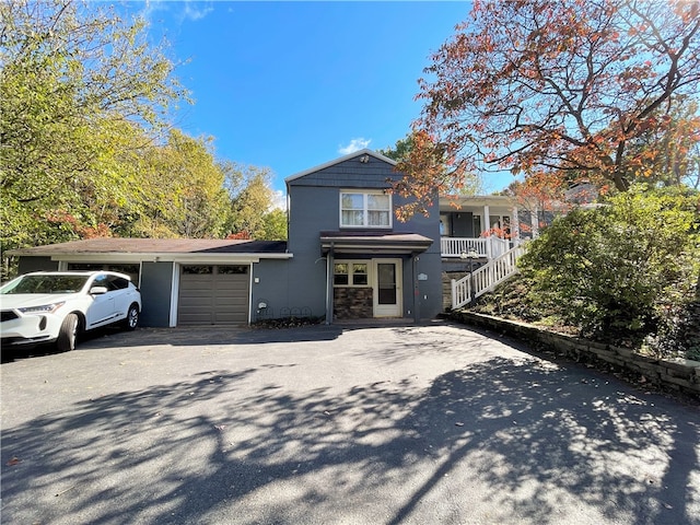 front of property featuring a garage