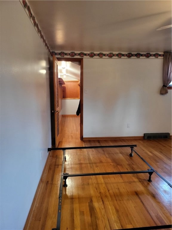 spare room featuring hardwood / wood-style floors