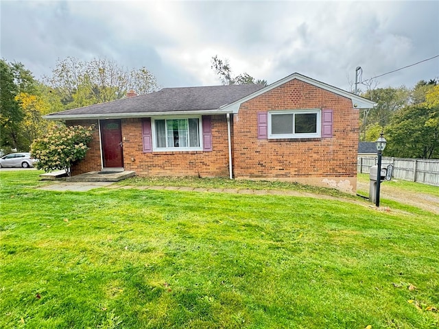 view of front of house with a front lawn