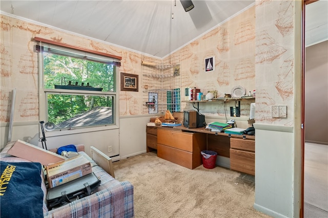 carpeted office space with ornamental molding, vaulted ceiling, and ceiling fan