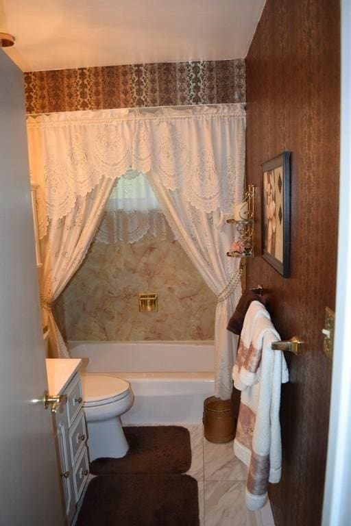 720 Pollard St, Monessen, PA 15062 - bathroom featuring vanity, marble finish floor, shower / bath combo with shower curtain, and toilet