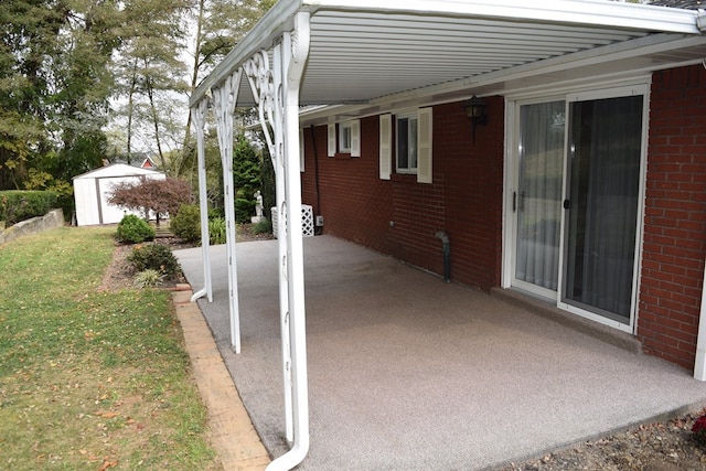 view of patio / terrace with a storage shed