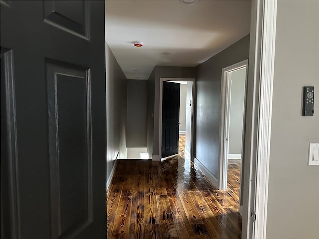 hall featuring dark hardwood / wood-style floors