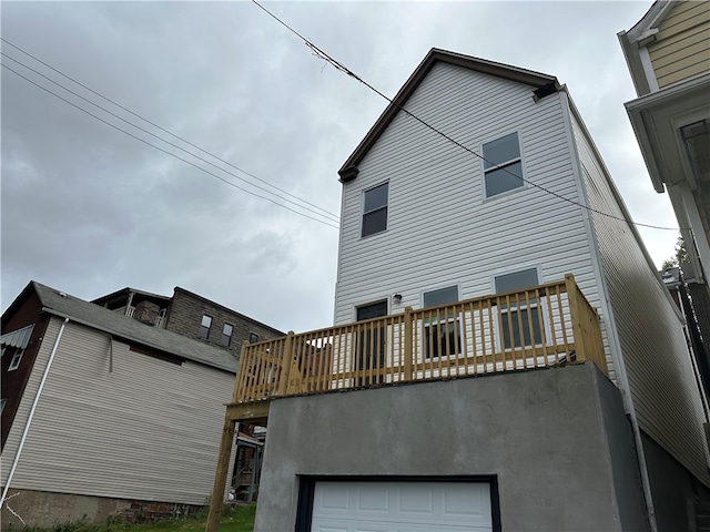 rear view of house featuring a balcony