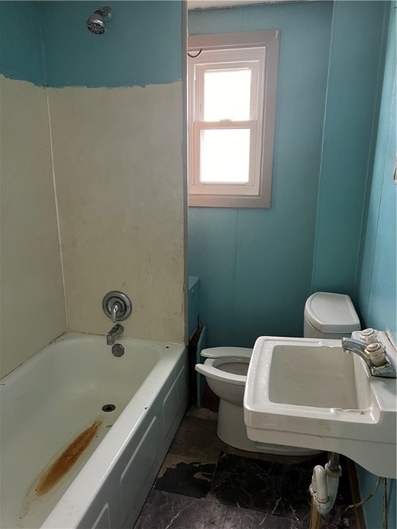 full bathroom featuring bathtub / shower combination, sink, and toilet