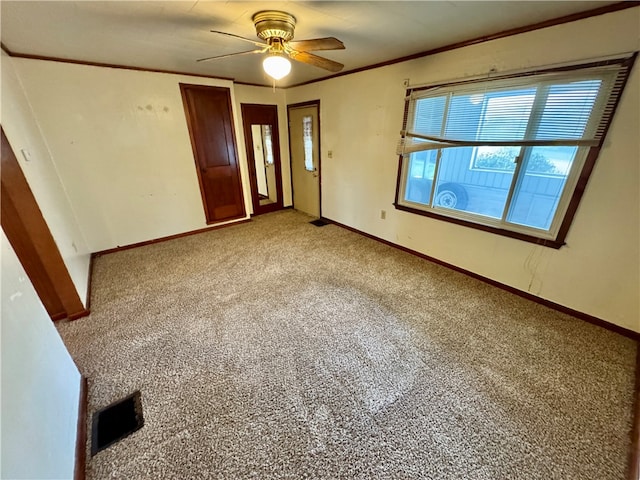 interior space with ceiling fan