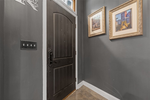 view of tiled foyer entrance