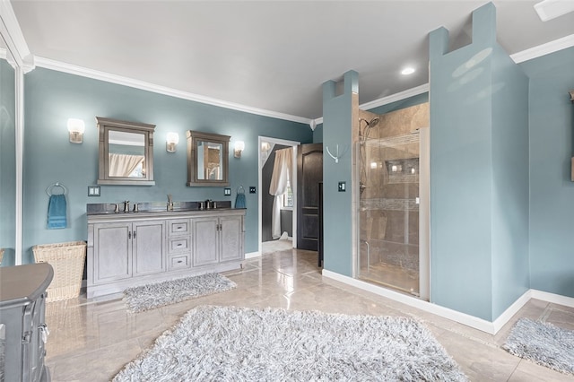 bathroom with a shower with door, vanity, and crown molding