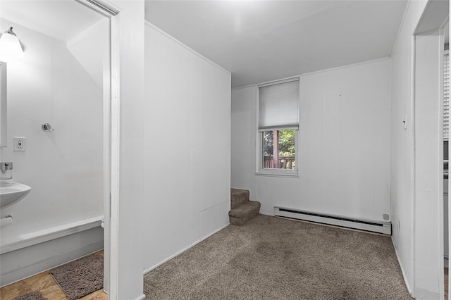 bathroom with a baseboard heating unit