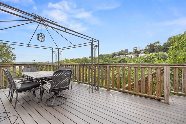 wooden terrace with a gazebo