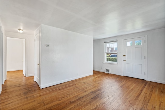 foyer with light wood-type flooring