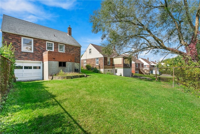 view of yard with a garage