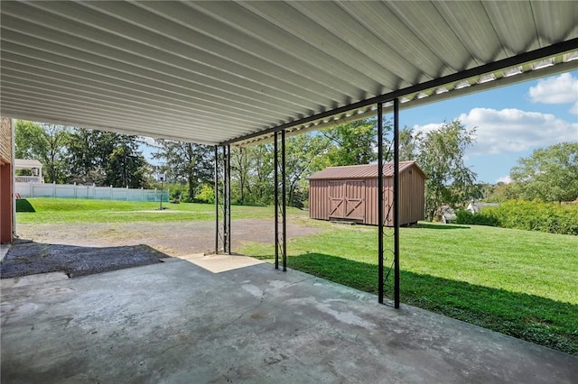 view of patio with a storage unit