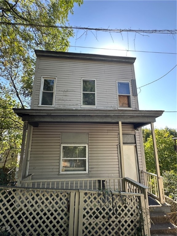 back of house with a porch