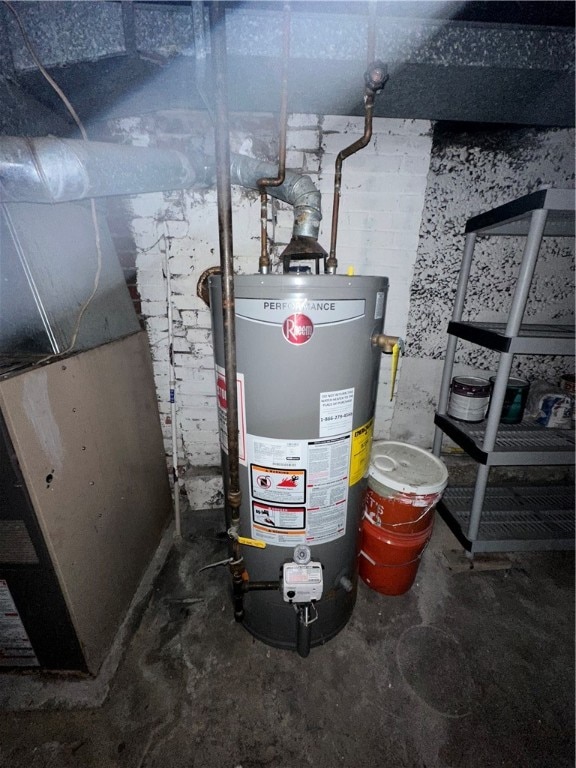 utility room with water heater