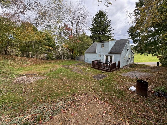 view of yard with a wooden deck