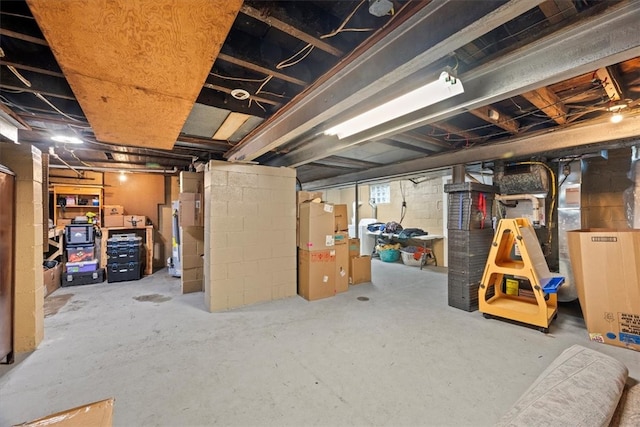 basement featuring water heater