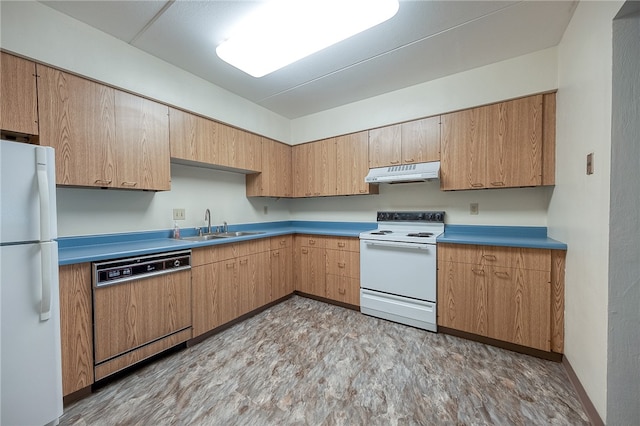 kitchen with light hardwood / wood-style flooring, sink, and white appliances