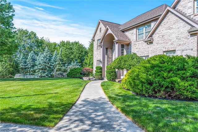 view of home's exterior featuring a lawn