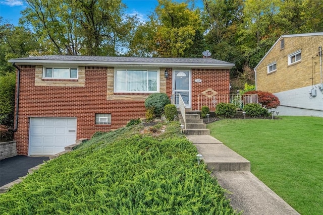 view of front of home featuring a garage and a front lawn