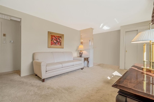 living room with light colored carpet